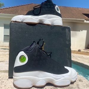 Black and white Aid Jordan retro 13